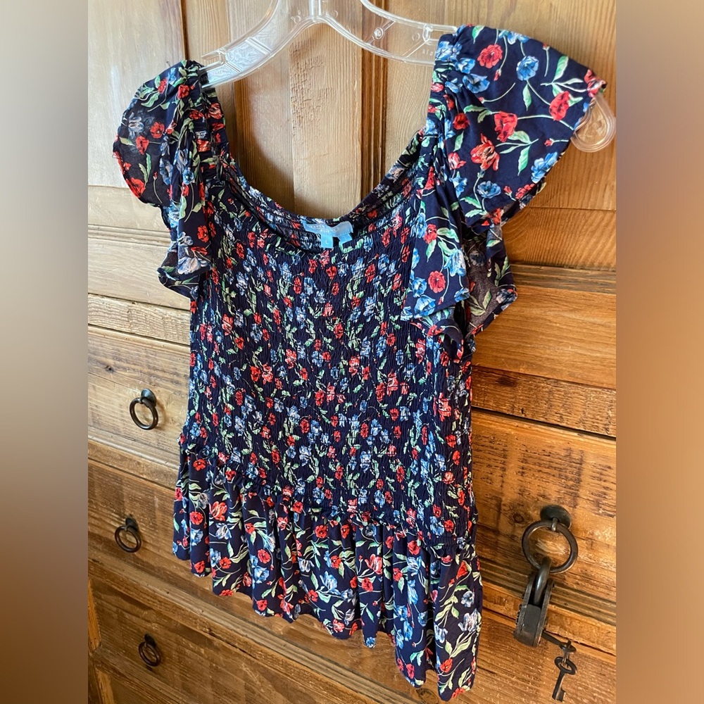 Dark blue floral top with ruffles
